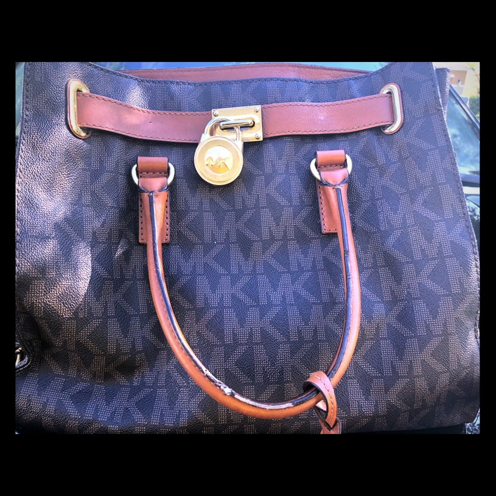 Michael Kors Purse; signature design; leather;